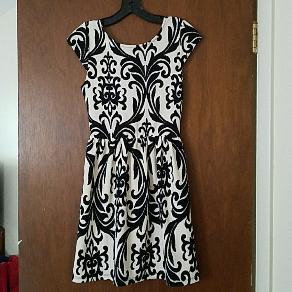 Black and white scooped back dress